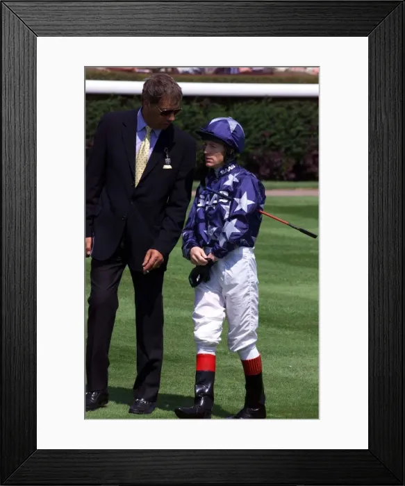 Framed Print : Henry Cecil talks to jockey Kieren Fallon at Goodwood July 1999 who sacked from his