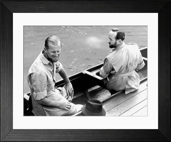 Framed Print : The Duke of Edinburgh and Lieutenant-Commander Parker in a canoe during his visit to Framed Print : The Duke of Edinburgh and Lieutenant-Commander Parker in a canoe during his visit to