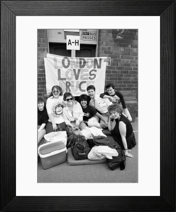 Framed Print : Fans queue outside football ground ahead of Bruce Springsteen Concert at Villa Park Framed Print : Fans queue outside football ground ahead of Bruce Springsteen Concert at Villa Park
