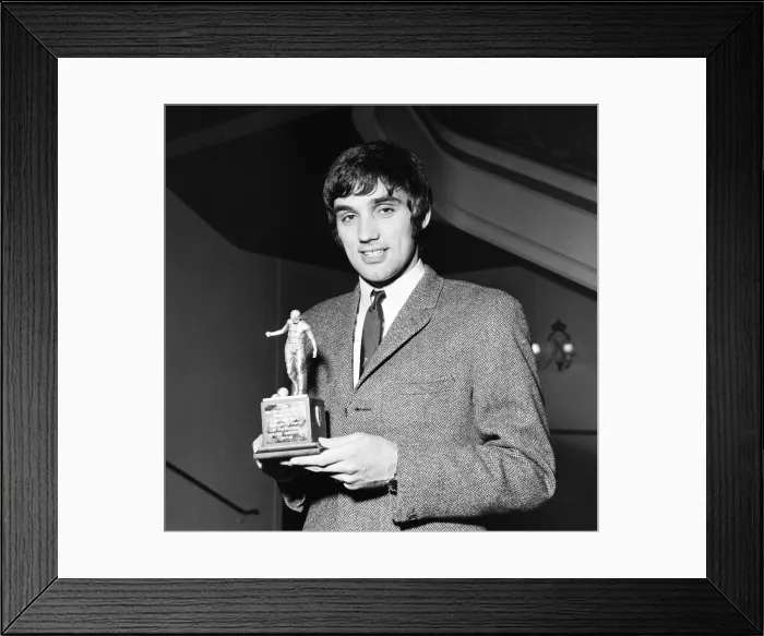 Framed Print : Manchester United star George Best holding his Footballer of the Year trophy Framed Print : Manchester United star George Best holding his Footballer of the Year trophy