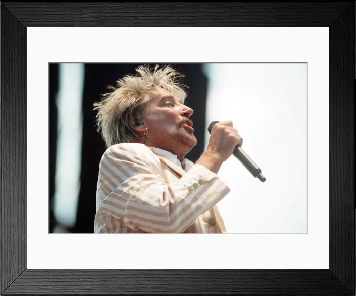 Framed Print : Rock star Rod Stewart performs some of his most famous hits during a gig at Villa Park Framed Print : Rock star Rod Stewart performs some of his most famous hits during a gig at Villa Park