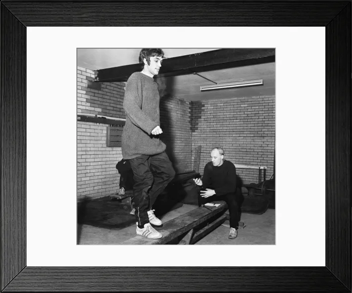 Framed Print : Manchester United footballer George Best during a training session. February 1968