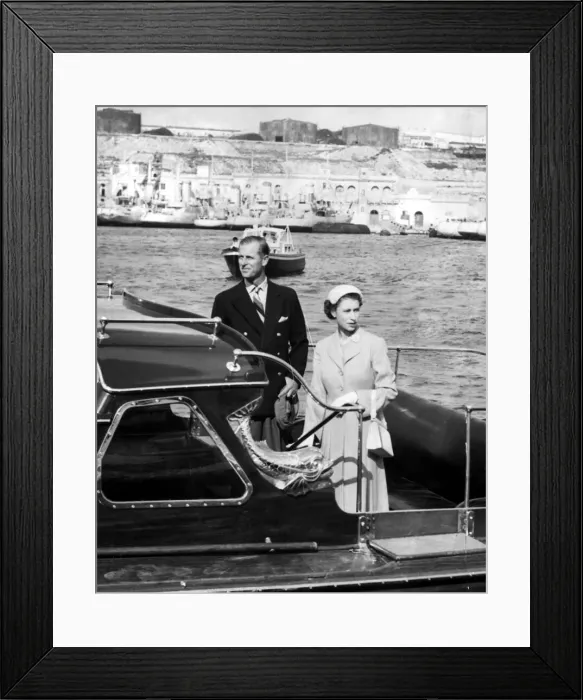 Framed Print : Queen Elizabeth II and Prince Philip leave Malta harbour to go aboard the Royal Yatch Framed Print : Queen Elizabeth II and Prince Philip leave Malta harbour to go aboard the Royal Yatch