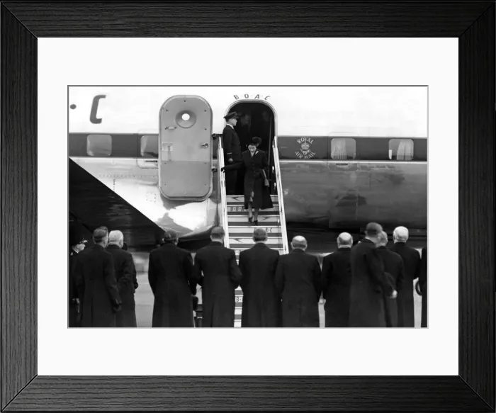 Framed Print : Queen Elizabeth II, Princess Elizabeth steps from her plane at London Airport after being Framed Print : Queen Elizabeth II, Princess Elizabeth steps from her plane at London Airport after being