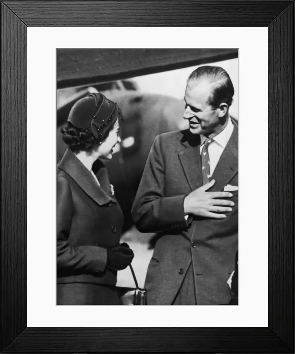 Framed Print : The Queen and The Duke of Edinburgh share a moment after being re-united for the first