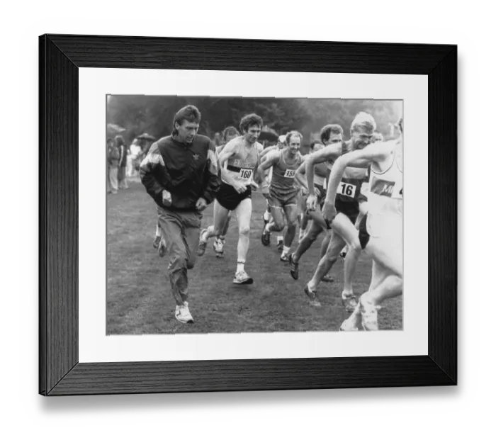Framed Print : Athlete Dave Moorcroft joins joggers on a charity fun run in Courdon Park, Coventry