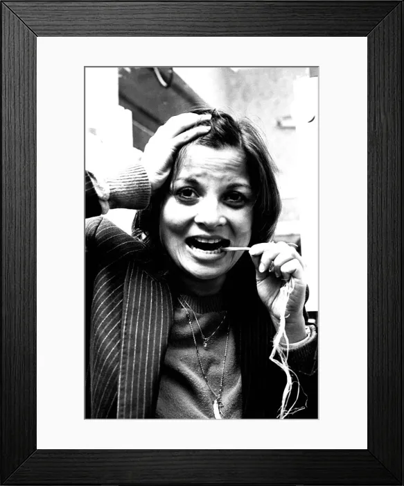 Framed Print : Sexy actress Francoise Pascal is driving down to London to see her dentist to get rid of