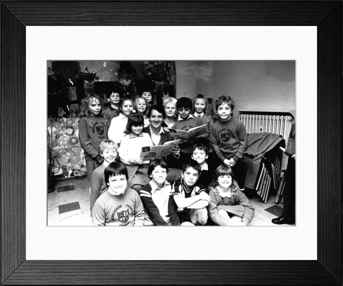 Framed Print : Actor Michael Palin pays a surprise visit to Monkhouse Primary School in North Shields to Framed Print : Actor Michael Palin pays a surprise visit to Monkhouse Primary School in North Shields to
