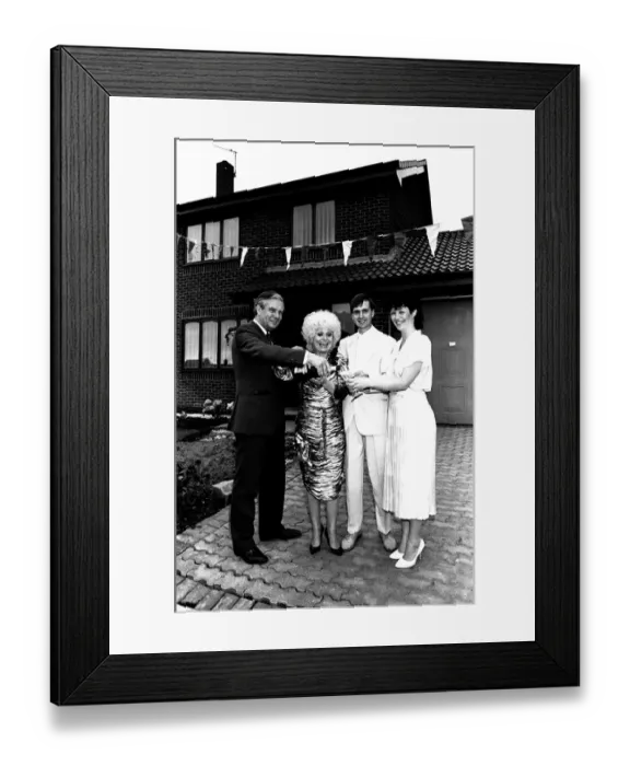 Framed Print : Actress Barbara Windsor proposes a house-warming toast to DIY builders Allan Framed Print : Actress Barbara Windsor proposes a house-warming toast to DIY builders Allan