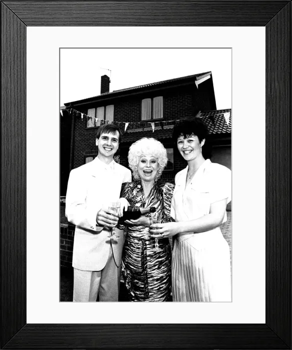 Framed Print : Actress Barbara Windsor proposes a house-warming toast to DIY builders Allan Framed Print : Actress Barbara Windsor proposes a house-warming toast to DIY builders Allan