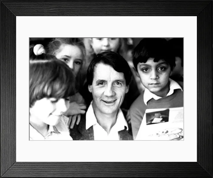 Framed Print : Actor Michael Palin pays a surprise visit to Monkhouse Primary School in North Shields to
