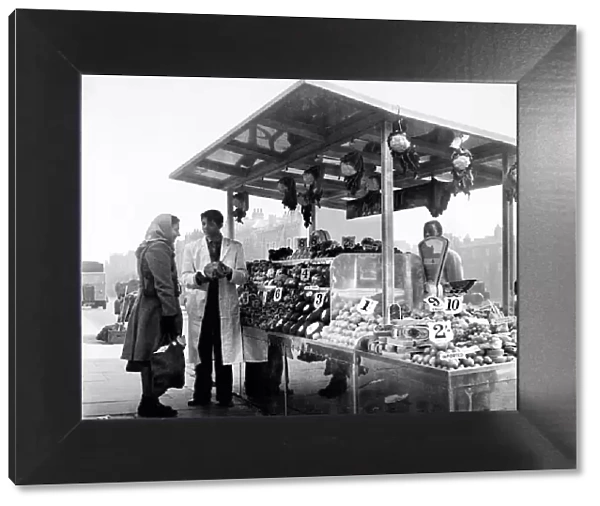 De-Luxe Street Stall. Takings doubled when a de-lux street stall opened for business in