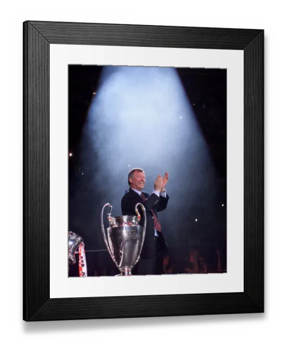 Framed Print : Alex Ferguson in the spotlight receiving May 1999 the cheers of the Manchester