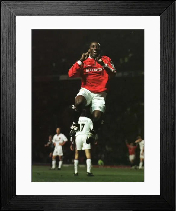 Framed Print : Dwight Yorke Manchester United striker January 1999 celebrates after scoring against West