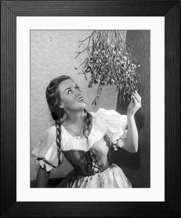 Framed Print : Young woman with Mistletoe, 4th November 1959 Framed Print : Young woman with Mistletoe, 4th November 1959