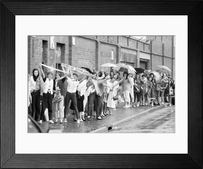 Framed Print : Fans queue outside football ground ahead of Duran Duran Concert at Villa Park, Birmingham Framed Print : Fans queue outside football ground ahead of Duran Duran Concert at Villa Park, Birmingham