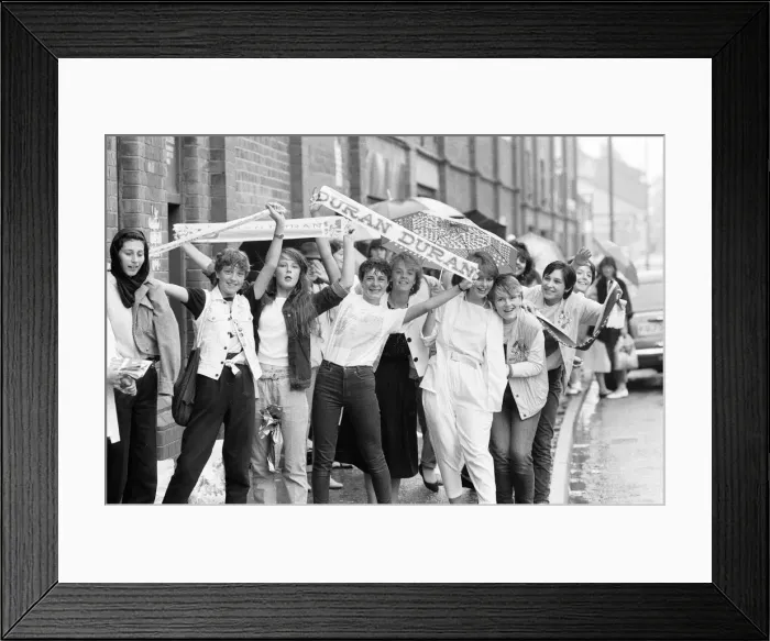 Framed Print : Fans queue outside football ground ahead of Duran Duran Concert at Villa Park, Birmingham