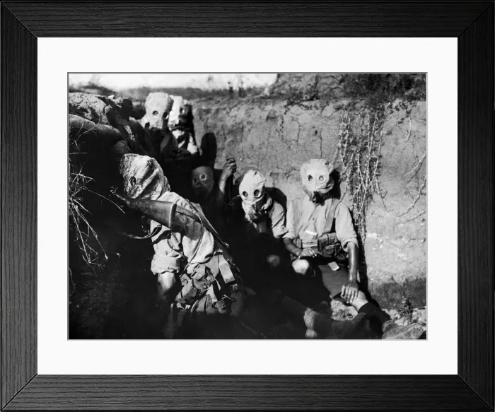 Framed Print : British troops of the Irish 10th Division seen here wearing gas masks in the trenches in