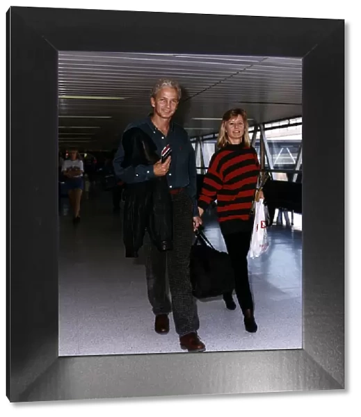 David Gower Cricketer with his girlfriend Thorunn Nash pictured at Heathrow airport