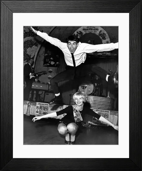 Framed Print : Dances The Twist. A couple demonstrate dancing the twist at the Twist Framed Print : Dances The Twist. A couple demonstrate dancing the twist at the Twist