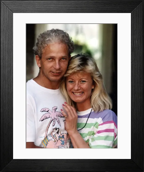Framed Print : David Gower ex England Cricket player hugs Thorrun Nash the half Icelandic lady who he Framed Print : David Gower ex England Cricket player hugs Thorrun Nash the half Icelandic lady who he