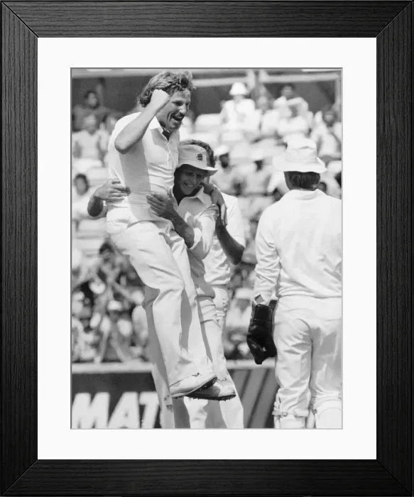Framed Print : Cricketer Ian Botham celebrates with David Gower 1984 after taking his 300th Test Wicket