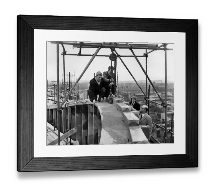 Framed Print : Rebuilding Coventry. Men at work, attaching the keystone to complete the masonry