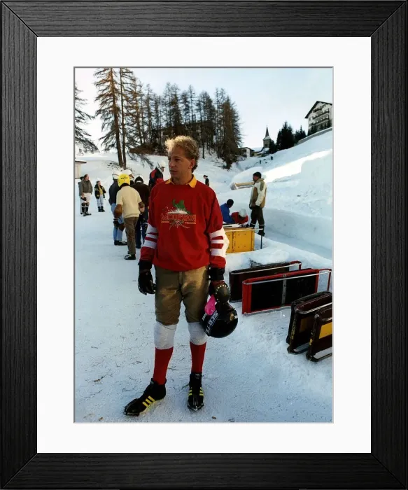 Framed Print : David Gower former England cricket captain sledges down Cresta runduring a skiing break Framed Print : David Gower former England cricket captain sledges down Cresta runduring a skiing break