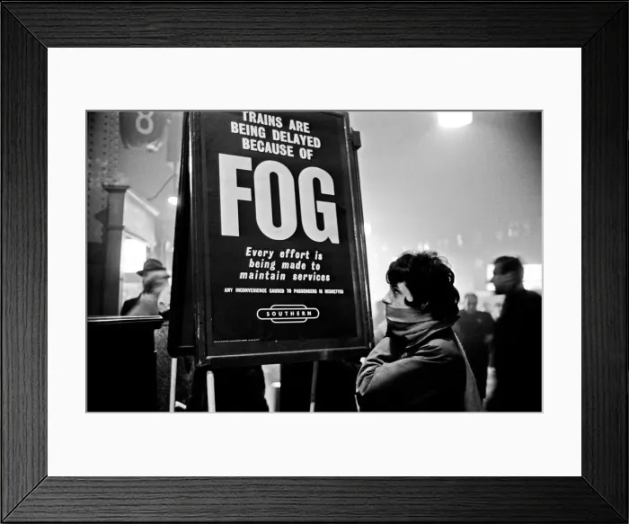 Framed Print : Crowds of people waiting at Waterloo station as trains are delayed due to fog Framed Print : Crowds of people waiting at Waterloo station as trains are delayed due to fog