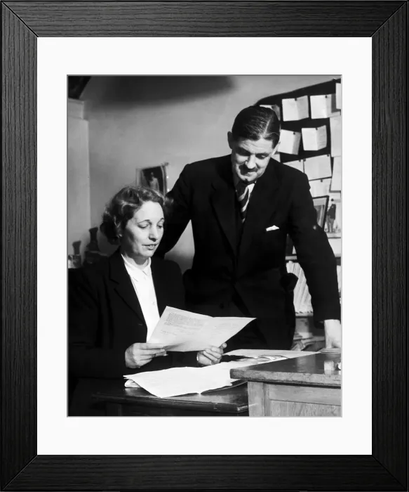 Framed Print : Edith Pitt, Conservative MP looks over the papers and agenda for a meeting with