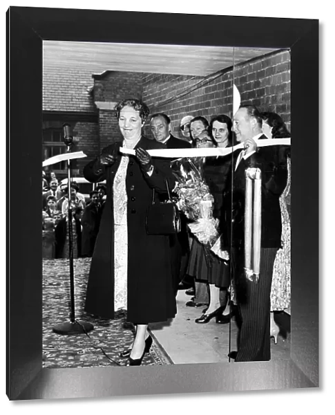 Edith Pitt, Conservative MP attending an opening event and cutting the ribbon