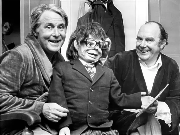 Morecambe & Wise, pictured with a ventriloquist dummy, following a performance at