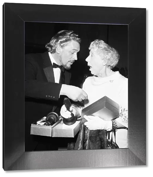 Paul Scofield and Dame Edith Evans after receiving their awards