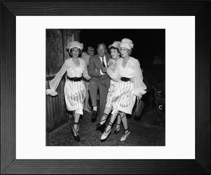 Framed Print : Kay Kendall left, enjoying a dance with ( left to right) Noel Coward