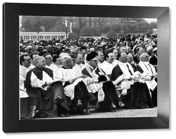 Attentive audience listen to Pope John Paul II Mass at Heaton Park, Manchester