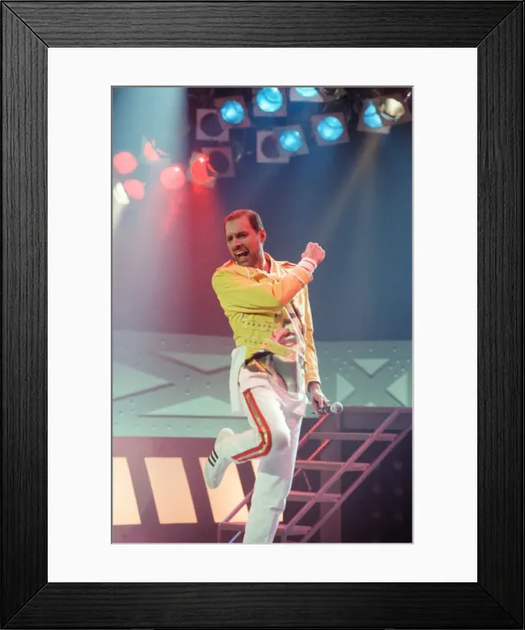 Framed Print : Freddie Mercury, lead singer of rock group Queen, performing on stage Framed Print : Freddie Mercury, lead singer of rock group Queen, performing on stage
