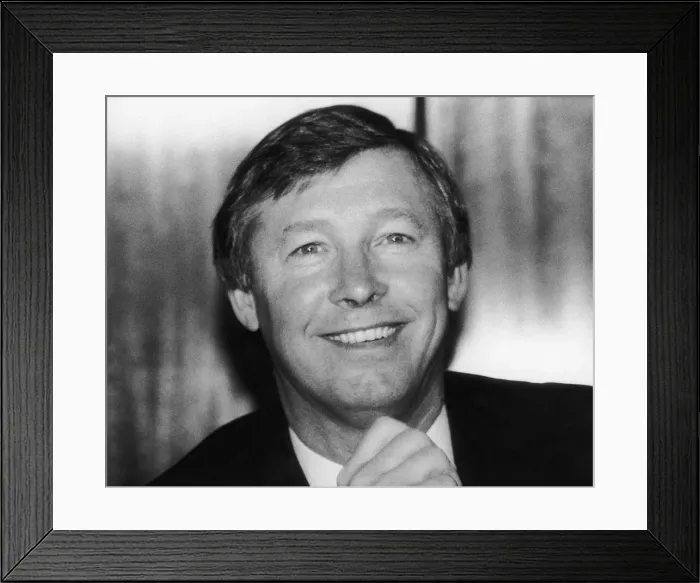 Framed Print : New Manchester United manager Alex Ferguson smiles after his appointment at Old Trafford Framed Print : New Manchester United manager Alex Ferguson smiles after his appointment at Old Trafford