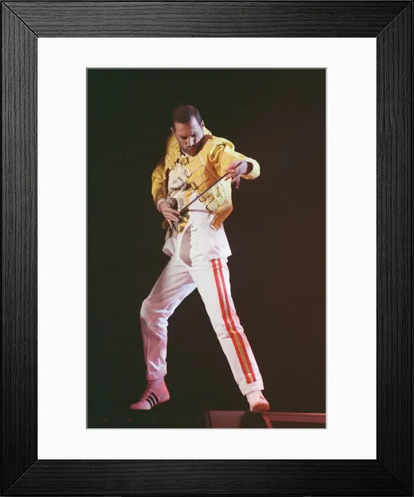 Framed Print : Freddie Mercury, lead singer of rock group Queen, performing on stage Framed Print : Freddie Mercury, lead singer of rock group Queen, performing on stage