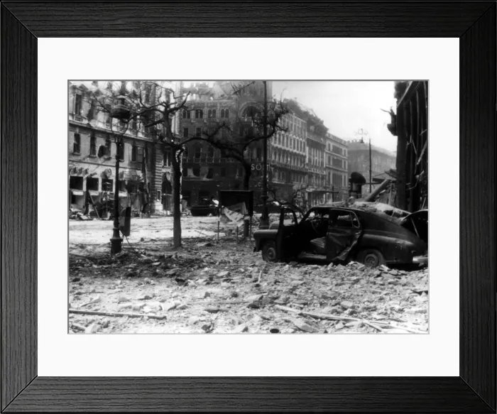 Framed Print : Russian tanks rumble past shattered buildings and piles of debris in Budapest, Hungary Framed Print : Russian tanks rumble past shattered buildings and piles of debris in Budapest, Hungary