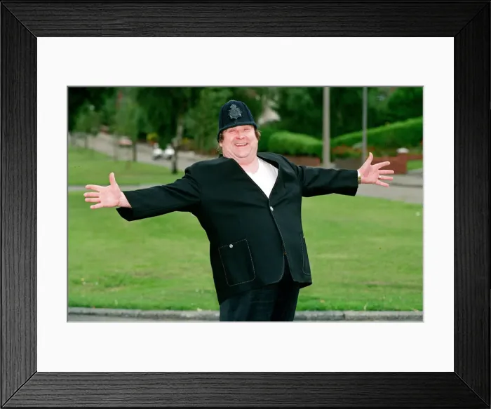 Framed Print : Bernard Manning dressed in a Policemans Uniform, 11th August 1992 Framed Print : Bernard Manning dressed in a Policemans Uniform, 11th August 1992