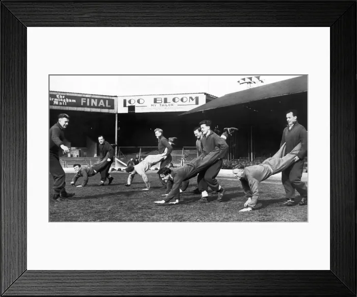 Framed Print : Birmingham City training. RTrainer Ray Shaw has the players performing the wheelbarrow Framed Print : Birmingham City training. RTrainer Ray Shaw has the players performing the wheelbarrow
