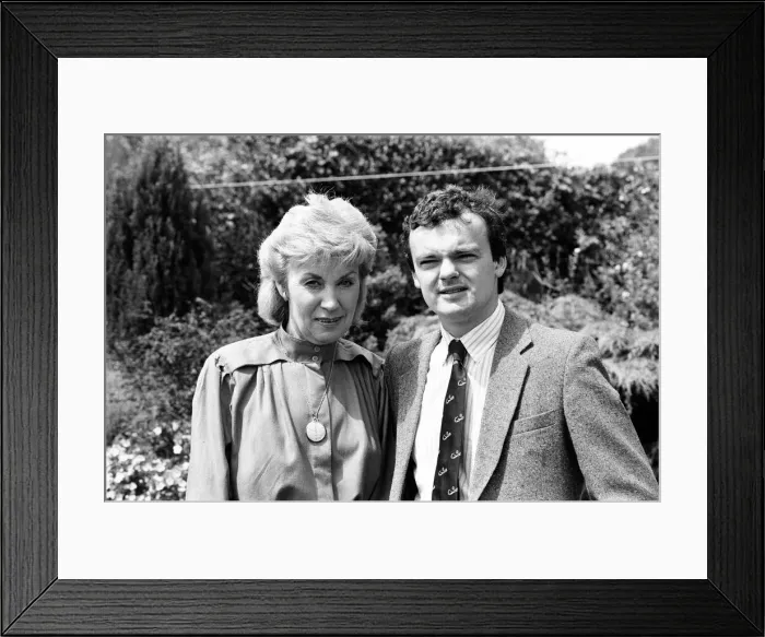 Framed Print : Joan Morecambe, widow of Eric Morecambe, pictured with son Gary, at home in Harpenden Framed Print : Joan Morecambe, widow of Eric Morecambe, pictured with son Gary, at home in Harpenden