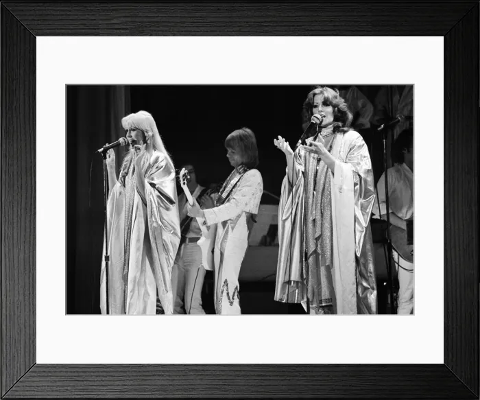 Framed Print : Swedish pop group ABBA consisting of Agnetha Faltskog, Bjorn Ulvaeus, Benny Andersson and Anni-Frid Lyngstad, pictured performing in Birmingham during their Second tour. 10th February 1977 Framed Print : Swedish pop group ABBA consisting of Agnetha Faltskog, Bjorn Ulvaeus, Benny Andersson and Anni-Frid Lyngstad, pictured performing in Birmingham during their Second tour. 10th February 1977
