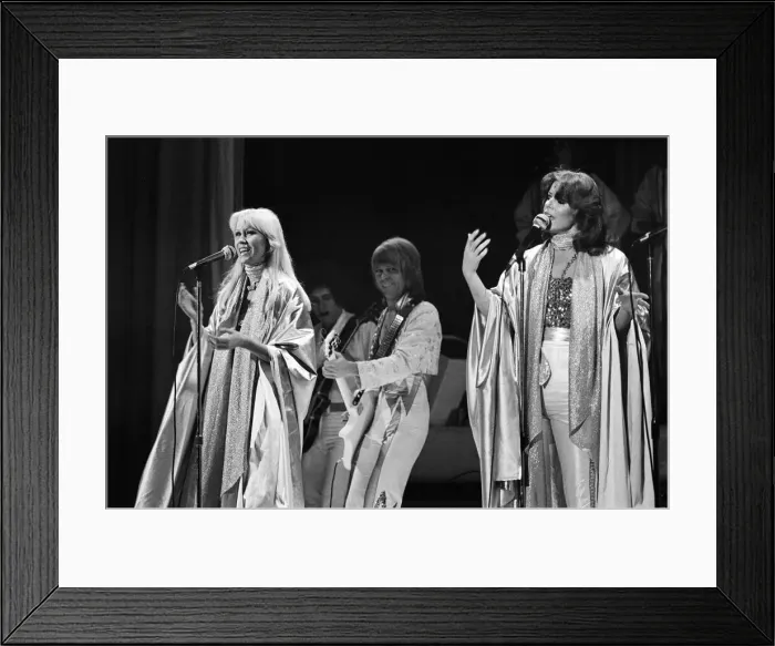 Framed Print : Swedish pop group ABBA consisting of Agnetha Faltskog, Bjorn Ulvaeus, Benny Andersson and Anni-Frid Lyngstad, pictured performing in Birmingham during their Second tour. 10th February 1977