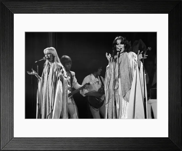 Framed Print : Swedish pop group ABBA consisting of Agnetha Faltskog, Bjorn Ulvaeus, Benny Andersson and Anni-Frid Lyngstad, pictured performing in Birmingham during their Second tour. 10th February 1977 Framed Print : Swedish pop group ABBA consisting of Agnetha Faltskog, Bjorn Ulvaeus, Benny Andersson and Anni-Frid Lyngstad, pictured performing in Birmingham during their Second tour. 10th February 1977