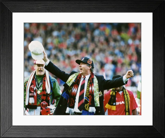 Framed Print : Manchester United manager Alex Ferguson celebrates as his team are crowned champions Framed Print : Manchester United manager Alex Ferguson celebrates as his team are crowned champions