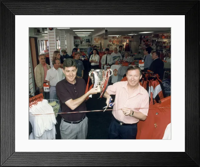 Framed Print : Manchester United manager Alex Ferguson with assistant coach holding the League Cup