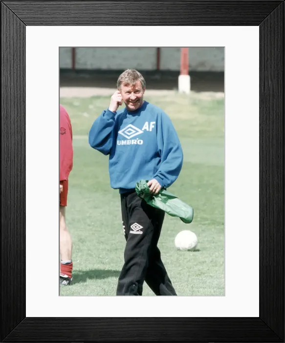 Framed Print : Manchester United manager Alex Ferguson in relaxed mood during a team training session Framed Print : Manchester United manager Alex Ferguson in relaxed mood during a team training session