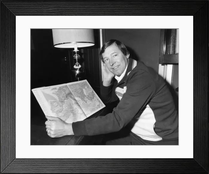 Framed Print : Aberdeen manager Alex Ferguson looks at a map of Europe as he prepares to takes his side Framed Print : Aberdeen manager Alex Ferguson looks at a map of Europe as he prepares to takes his side