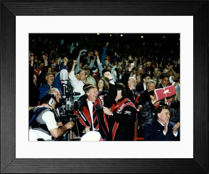 Framed Print : Manchester United manager Alex Ferguson celebrates with assistant Brian Kidd as his team Framed Print : Manchester United manager Alex Ferguson celebrates with assistant Brian Kidd as his team